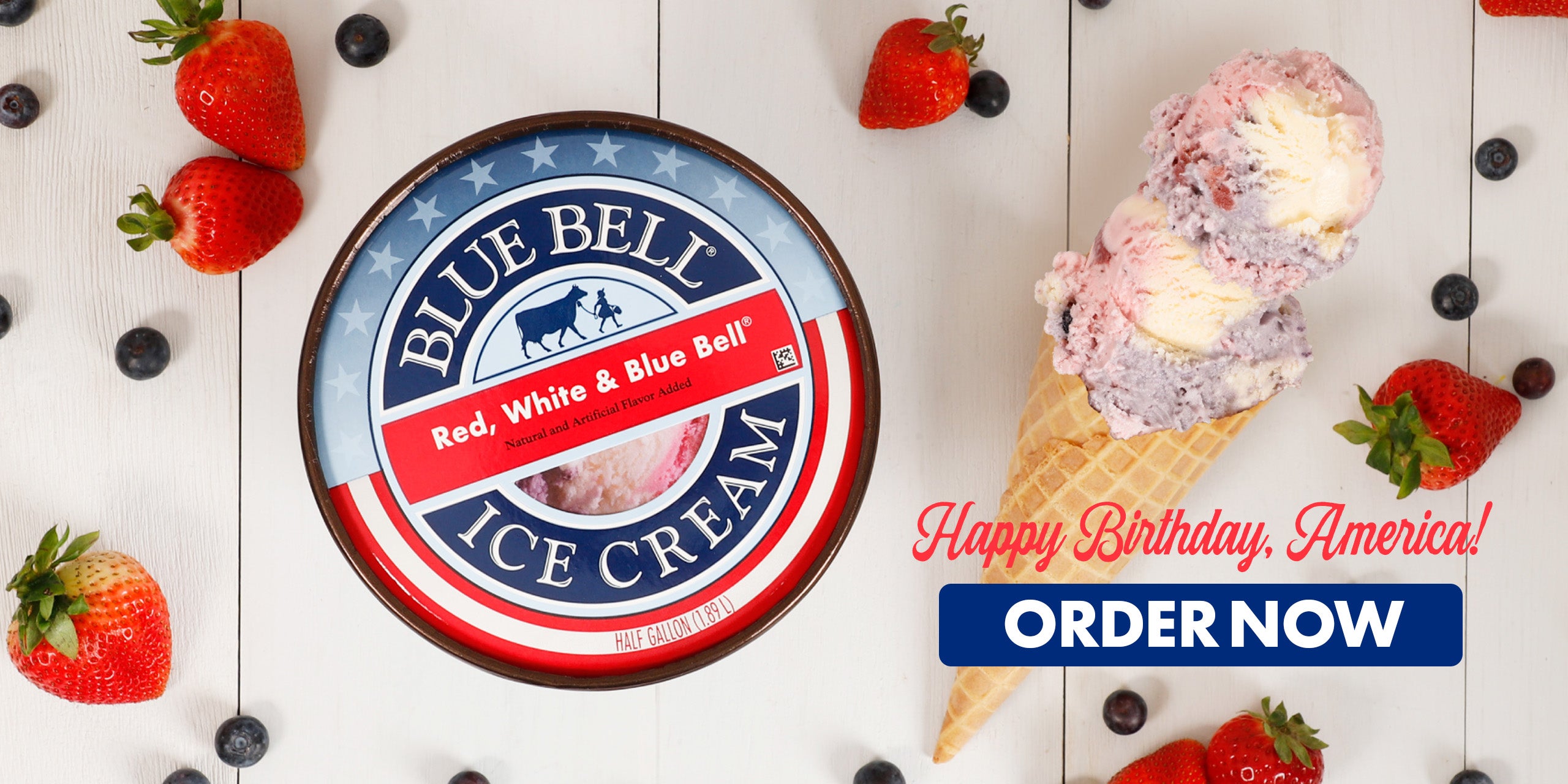 Blue Bell Red, White and Blue Bell Ice Cream container with ice cream cone, berries, and 'Happy Birthday, America!' text on a white background.