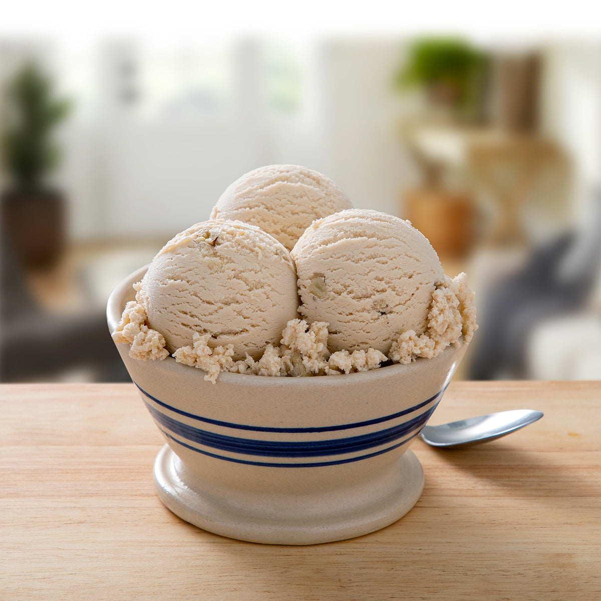 Black Walnut Ice Cream in a bowl with a spoon
