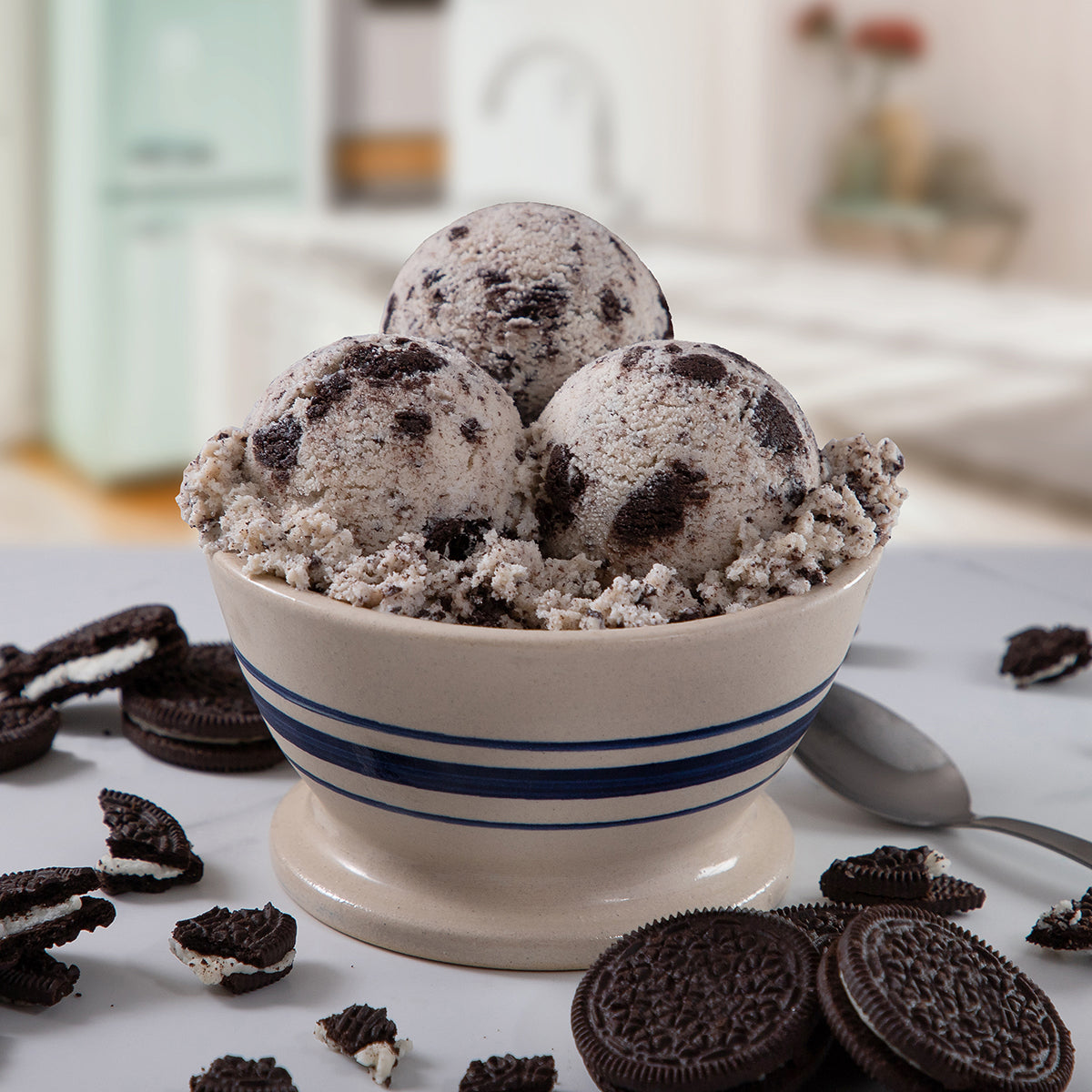 Bowl of Blue Bell Cookies 'n Cream Ice Cream with creme filled cookies and a spoon