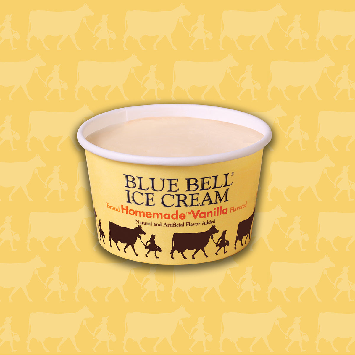 A cup of Blue Bell Homemade Vanilla Vanilla ice cream with a yellow carton featuring cow and girl silhouettes, set against a matching yellow background with a subtle cow and girl pattern.