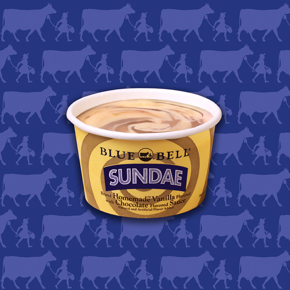 A Blue Bell Sundae cup of vanilla ice cream with chocolate flavored sauce, set against a blue background patterned with cow and girl silhouettes.